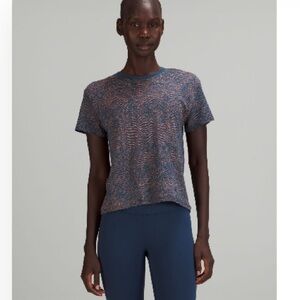 Lululemon Train to be short sleeve shirt. Color: ripple wave mineral blue/orange